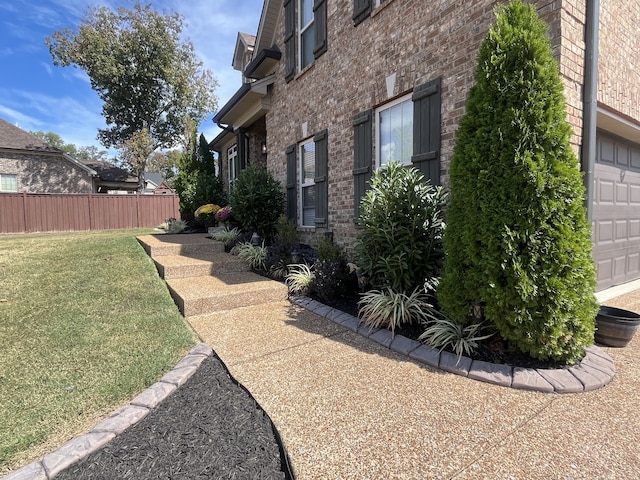 view of home's exterior featuring a lawn