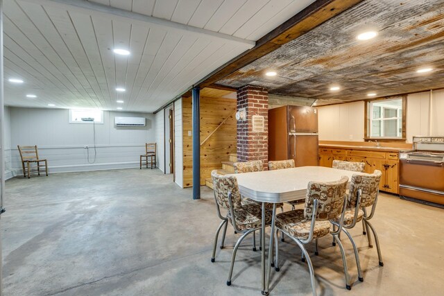 dining room with ornate columns, wood ceiling, and a wall mounted air conditioner