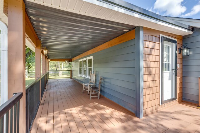 wooden deck featuring a porch