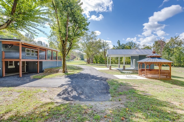 view of yard with a patio and a gazebo