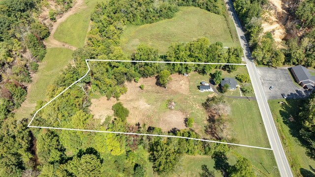 birds eye view of property featuring a rural view