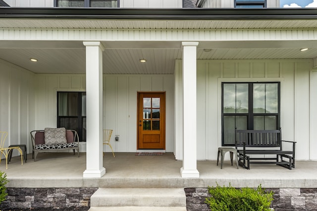 entrance to property with a porch