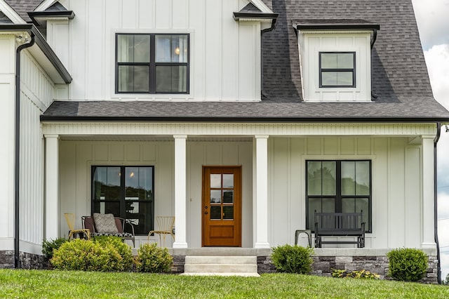 entrance to property with a porch