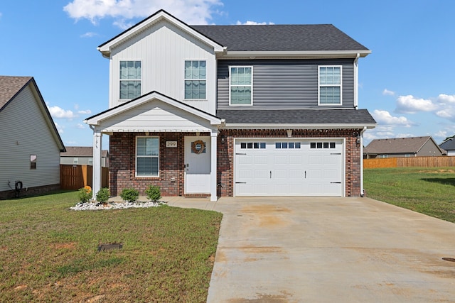 view of front facade featuring a front yard and a garage