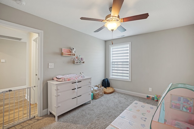 carpeted bedroom featuring ceiling fan