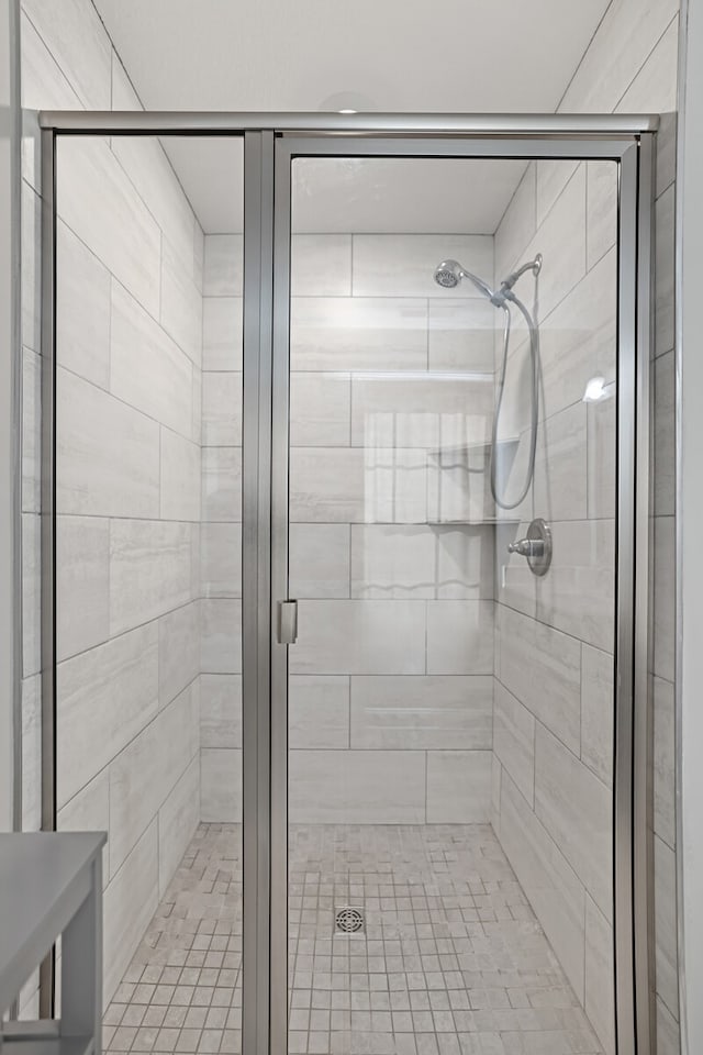 bathroom with an enclosed shower