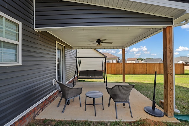 view of patio / terrace featuring ceiling fan