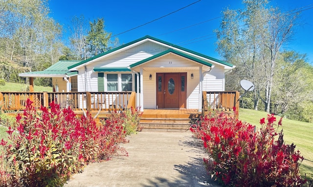 bungalow with a front yard