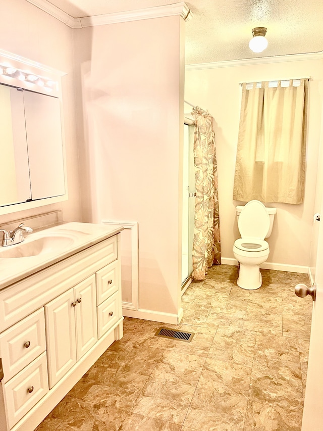 bathroom with ornamental molding, walk in shower, vanity, and toilet