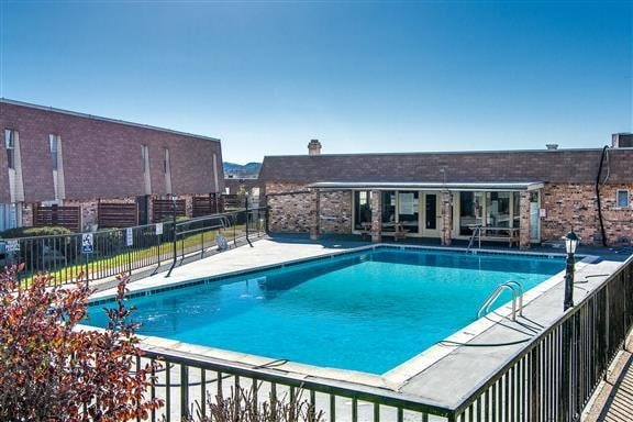 view of pool featuring a patio