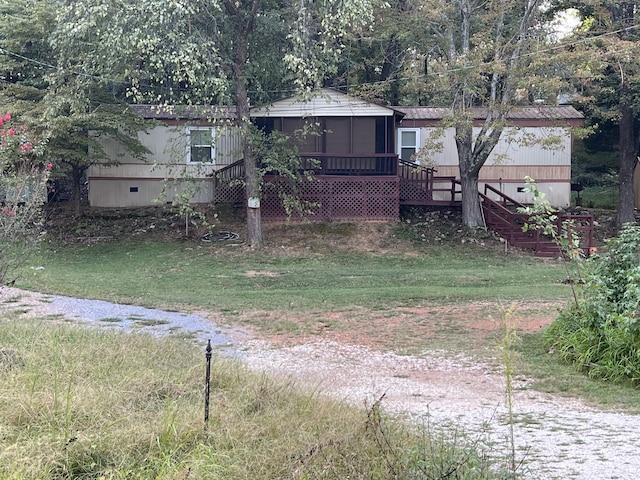 view of yard featuring a wooden deck