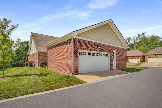 view of side of home featuring a yard and central AC