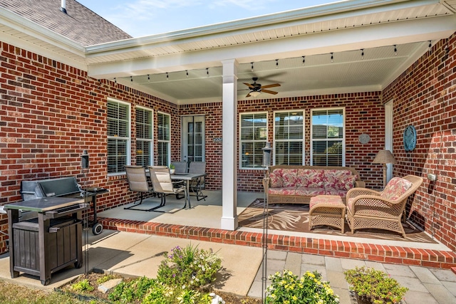 view of patio / terrace featuring ceiling fan, area for grilling, and outdoor lounge area