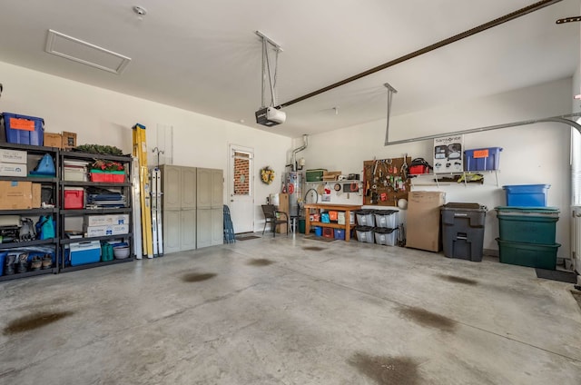 garage featuring a garage door opener