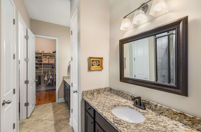 bathroom featuring vanity and tile patterned floors