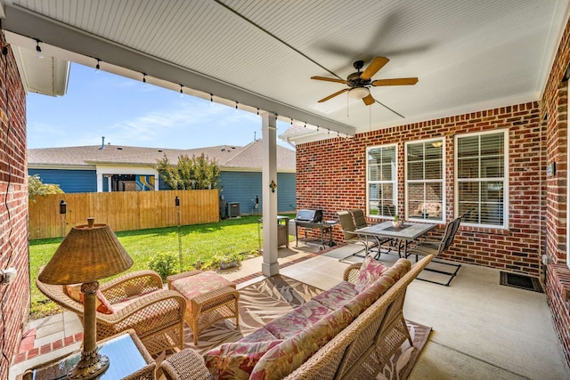 view of patio / terrace with ceiling fan and an outdoor hangout area