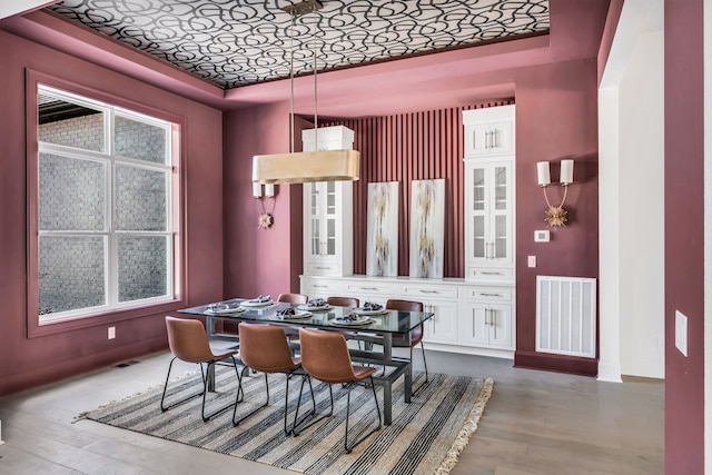 dining area with hardwood / wood-style flooring