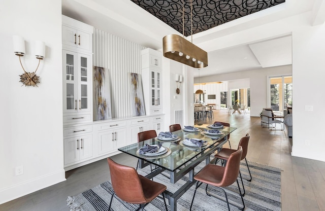 dining room with dark wood-type flooring