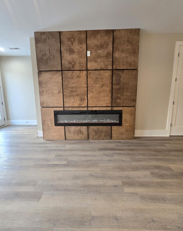 interior details featuring wood-type flooring