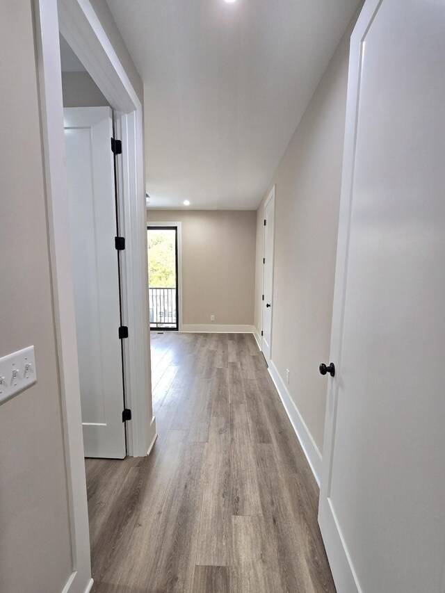 hallway featuring hardwood / wood-style floors