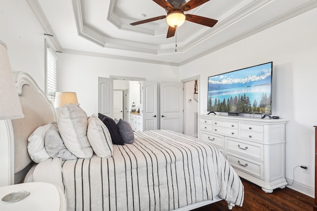 bedroom featuring ceiling fan, ornamental molding, and dark hardwood / wood-style flooring