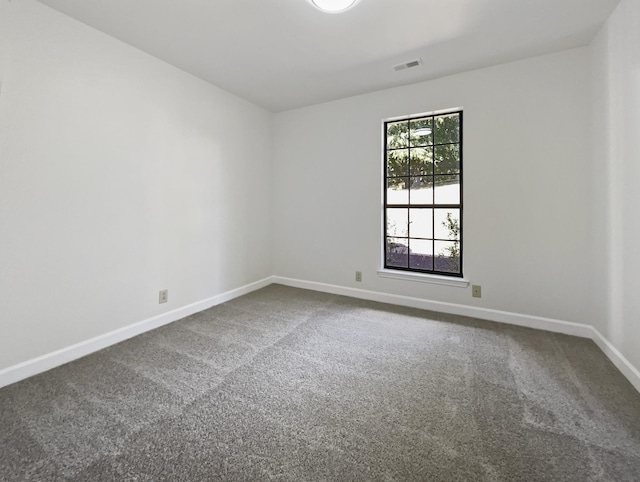 1515 Brentwood Pointe, Franklin, TN 37067 - unfurnished room featuring dark carpet, baseboards, and visible vents