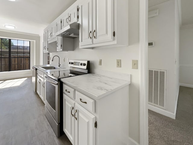 1515 Brentwood Pointe, Franklin, TN 37067 - kitchen with white cabinets, visible vents, appliances with stainless steel finishes, under cabinet range hood, and a sink