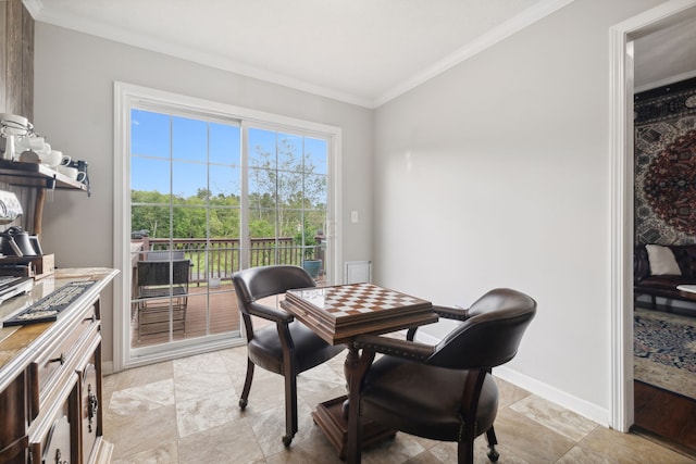 dining area featuring ornamental molding