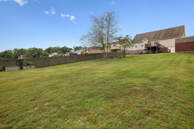 view of yard featuring a wooden deck