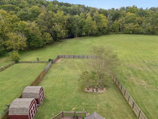 birds eye view of property with a rural view