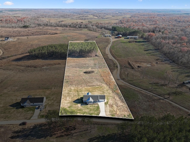 birds eye view of property featuring a rural view