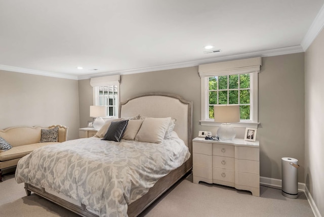 carpeted bedroom with crown molding