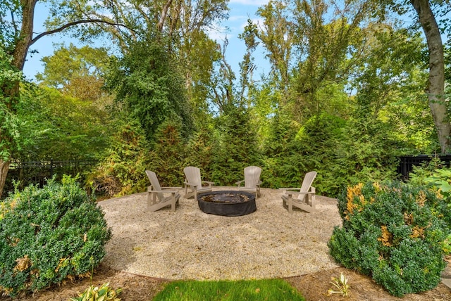 view of yard featuring a fire pit