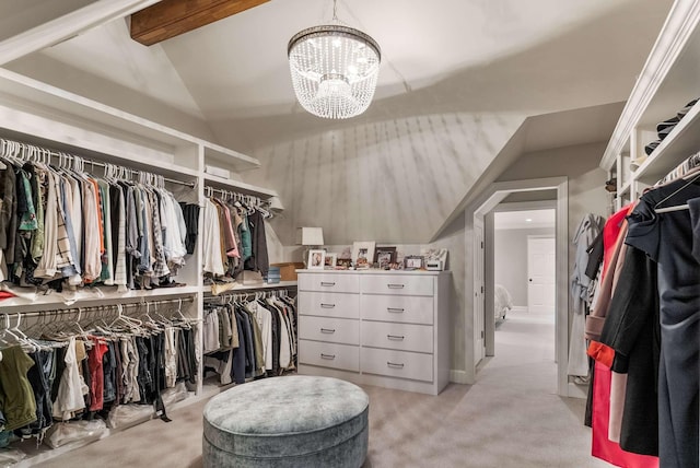 2304 Valley Brook Rd, Nashville, TN 37215 - spacious closet featuring light colored carpet, vaulted ceiling with beams, and an inviting chandelier