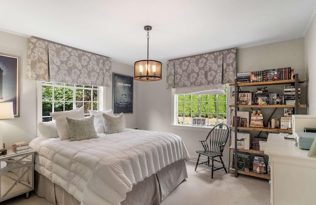 2304 Valley Brook Rd, Nashville, TN 37215 - bedroom with ornamental molding, carpet, and a chandelier