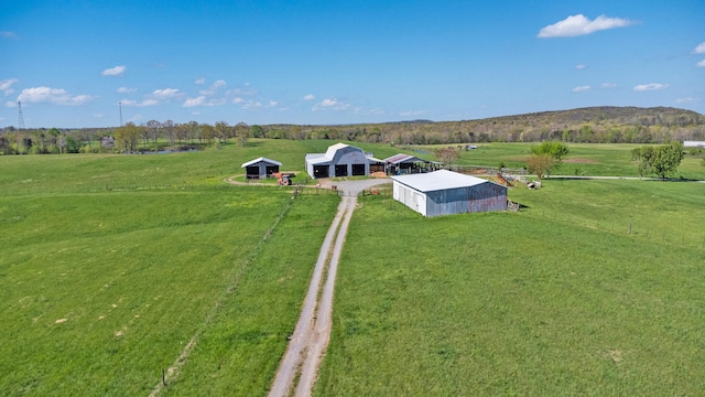 bird's eye view with a mountain view and a rural view