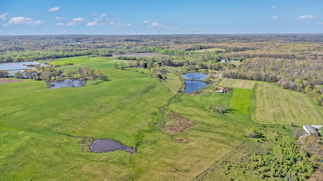 drone / aerial view with a rural view and a water view