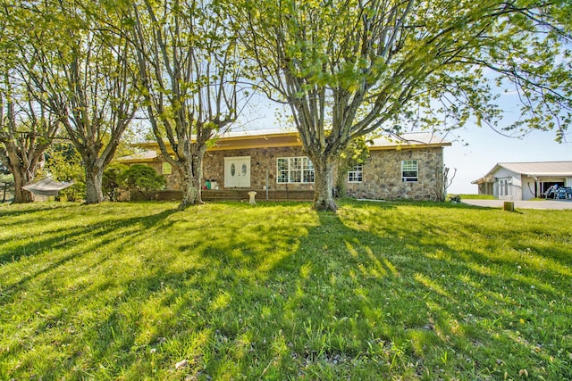 exterior space with a front yard