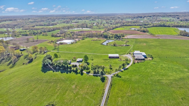 aerial view featuring a water view and a rural view