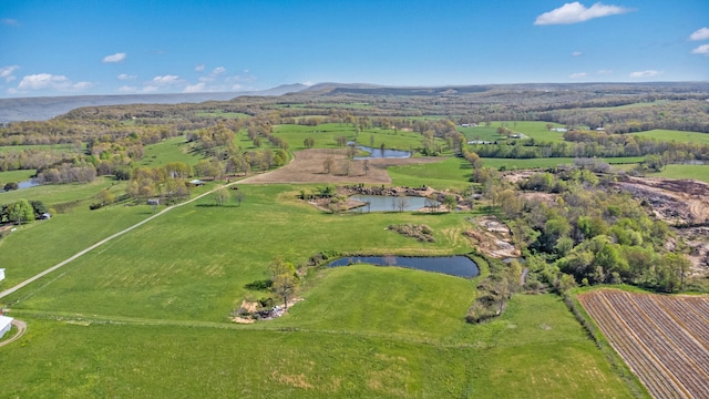 aerial view featuring a rural view and a water view