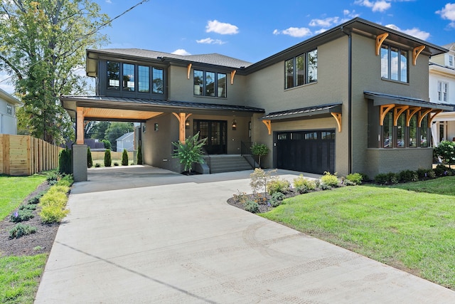 view of front facade with a carport and a front yard