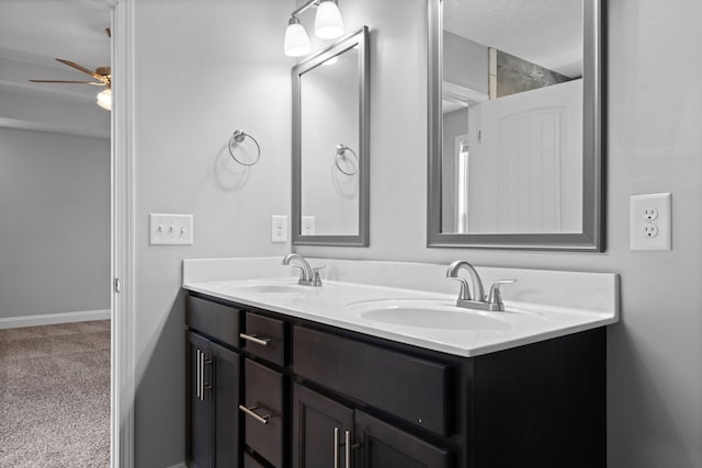 bathroom featuring ceiling fan and vanity