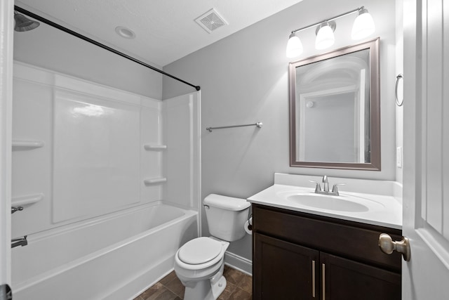 full bathroom with vanity, toilet, and bathtub / shower combination