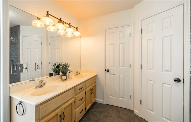 bathroom featuring walk in shower, vanity, and tile patterned flooring