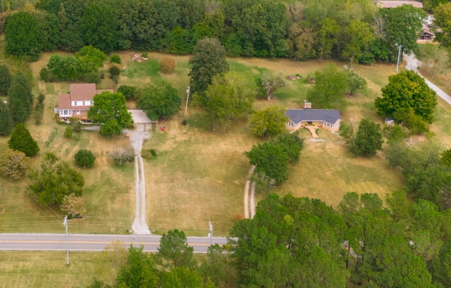 birds eye view of property featuring a rural view