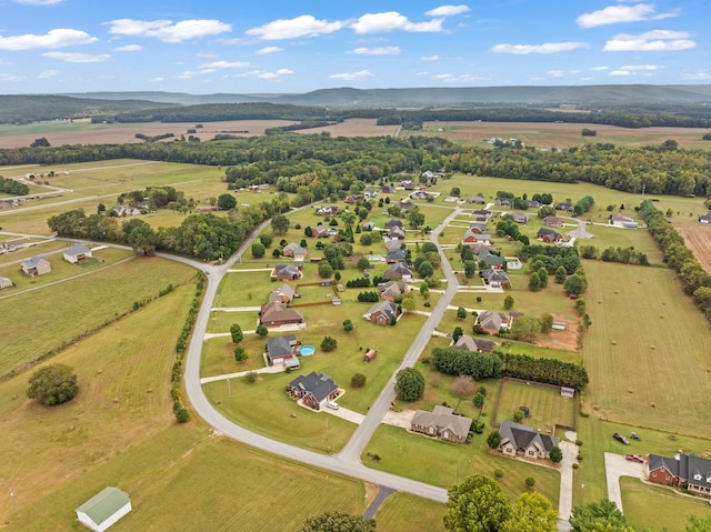 bird's eye view featuring a mountain view and a rural view