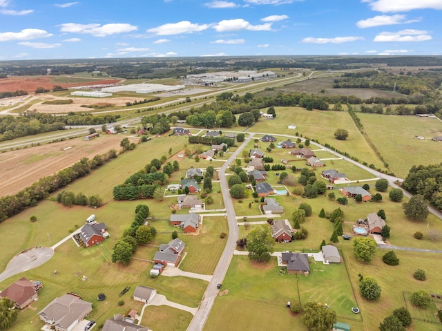 birds eye view of property featuring a rural view