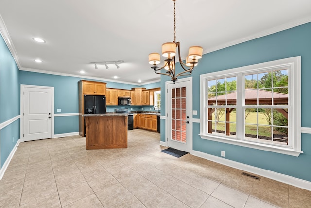 kitchen with light tile patterned floors, black appliances, crown molding, decorative light fixtures, and a notable chandelier