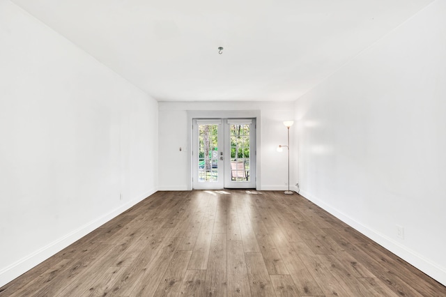 spare room with light wood-type flooring