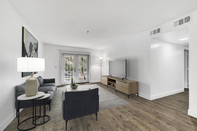 living room featuring dark hardwood / wood-style floors